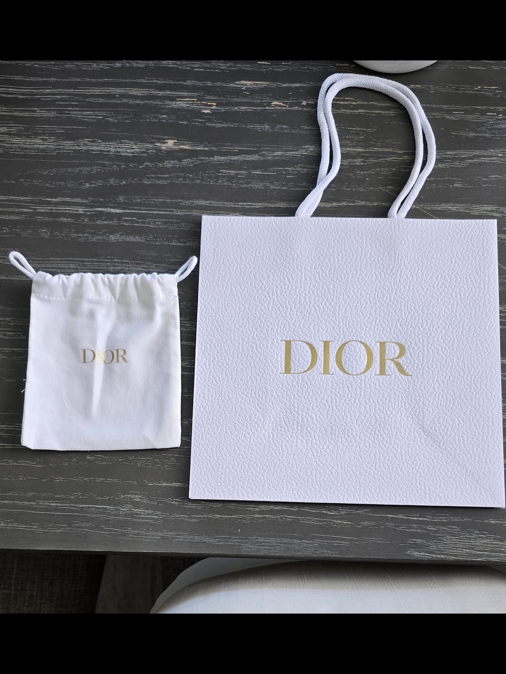 Dior White Logo Drawstring Pouch - Elegant Travel Accessory